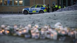 Police officers stand guard outside the adult education center Campus Risbergska school in Orebro, Sweden, on February 6, 2025 two days after a shooting there left eleven people dead. Several long-barrelled weapons have been found at the adult education centre in Sweden where a gunman killed 10 people, a police spokesman told AFP on February 6. Wednesday's shooting at Campus Risbergska, a school for young adults in Orebro, was Sweden's worst massacre. According to the Swedish press, the perpetrator of the attack, who probably committed suicide, held a permit for four hunting weapons. (Photo by Jonathan NACKSTRAND / AFP) (Photo by JONATHAN NACKSTRAND/AFP via Getty Images)          