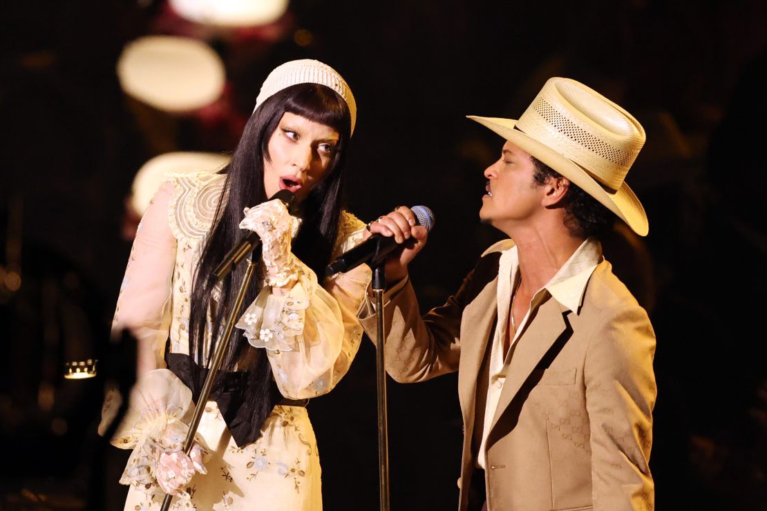 Lady Gaga and Bruno Mars perform onstage during the Grammy Awards. They are nominated for their duet 