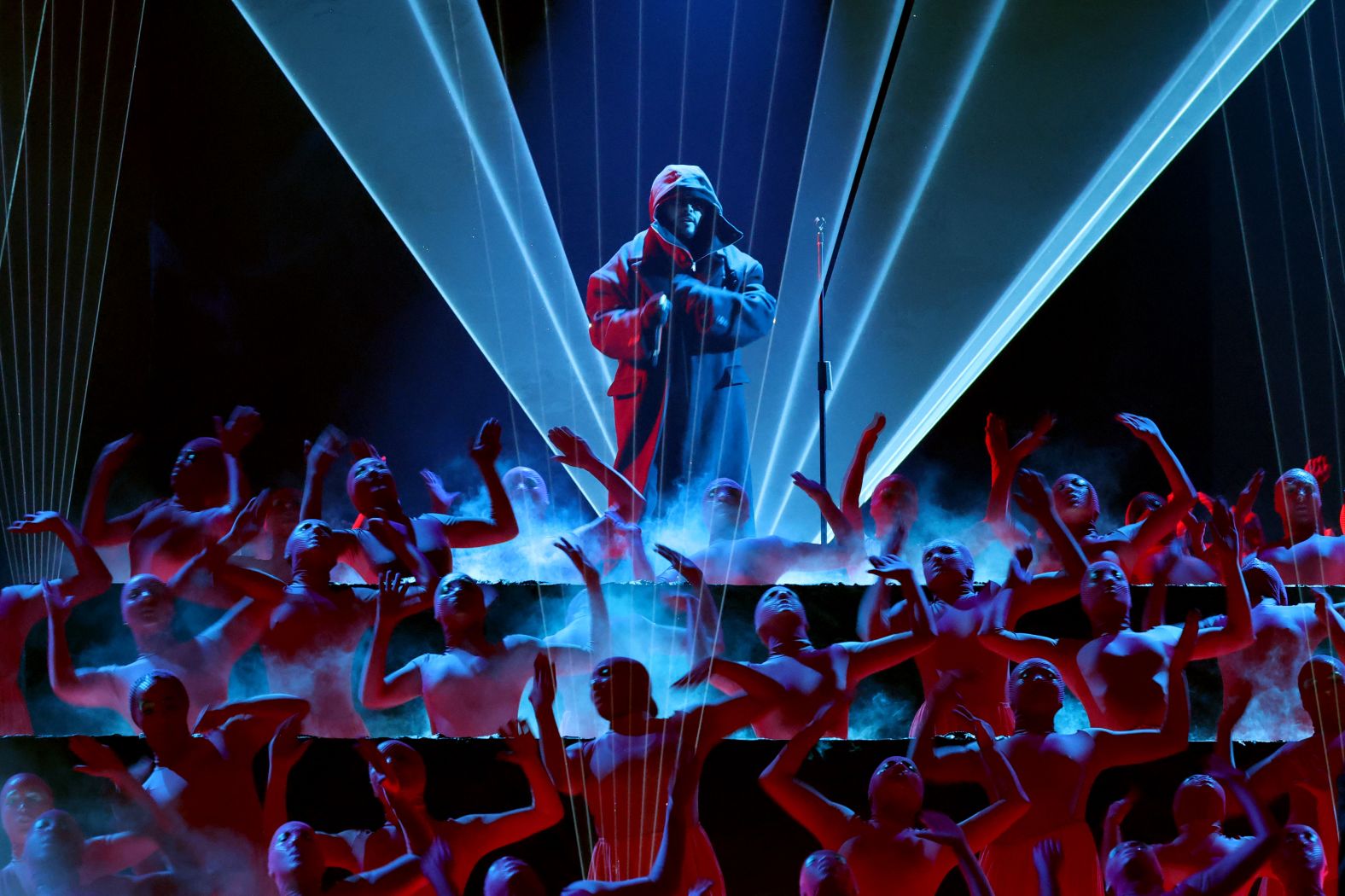 The Weeknd performs "Cry for Me" and "Timeless." It was <a href="index.php?page=&url=https%3A%2F%2Fwww.cnn.com%2Fentertainment%2Flive-news%2Fthe-grammys-award-show-02-2-25%23cm6offauy001o3b6mlwby1m73">his first performance at the Grammys</a> since he said four years ago that he was boycotting the show.