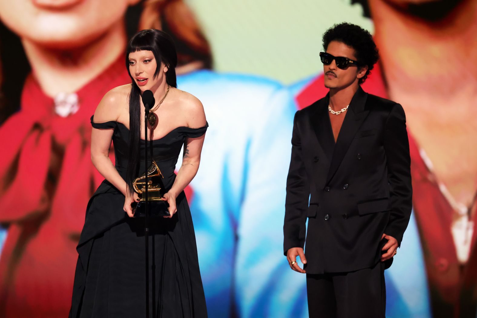 Lady Gaga and Bruno Mars accept the Grammy for best pop duo/group performance ("Die with a Smile"). <a href="https://www.cnn.com/entertainment/live-news/the-grammys-award-show-02-2-25#cm6oh4tk600053b6nqtvqv2nk">Gaga spoke out in support of the LGBTQ community</a>. “Trans people are not invisible,” she said. “Trans people deserve love. The queer community deserves to be lifted up. Music is love.”