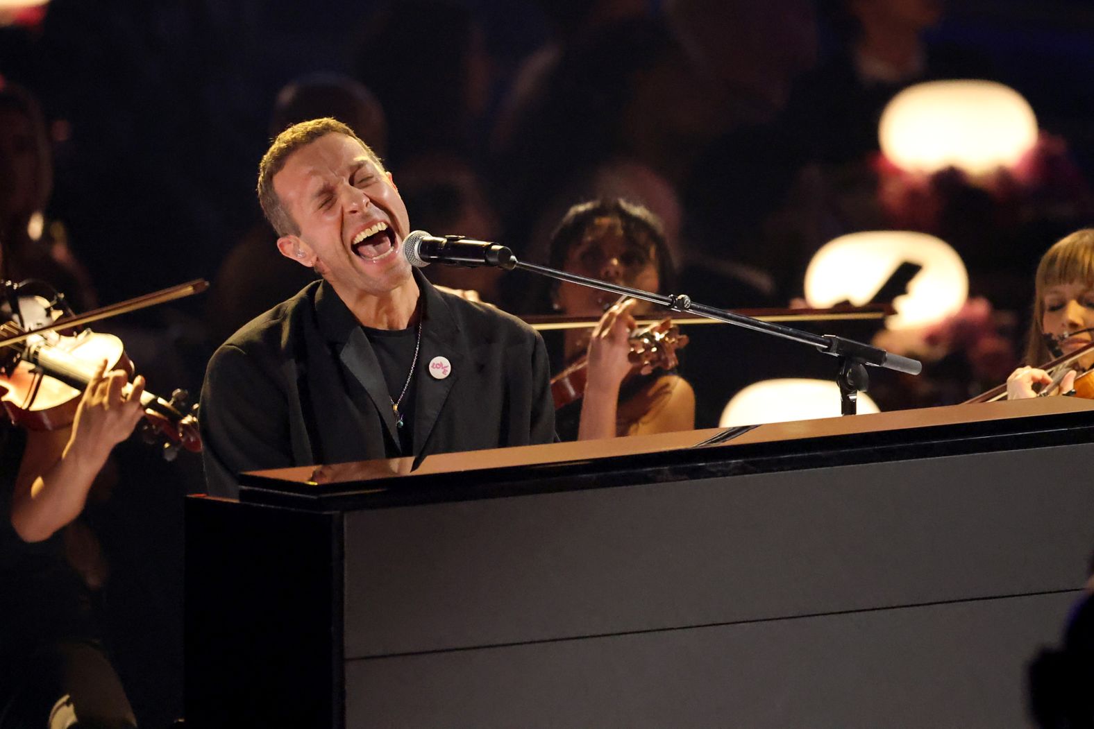 Chris Martin of Coldplay sings “All My Love” during the annual In Memoriam segment.