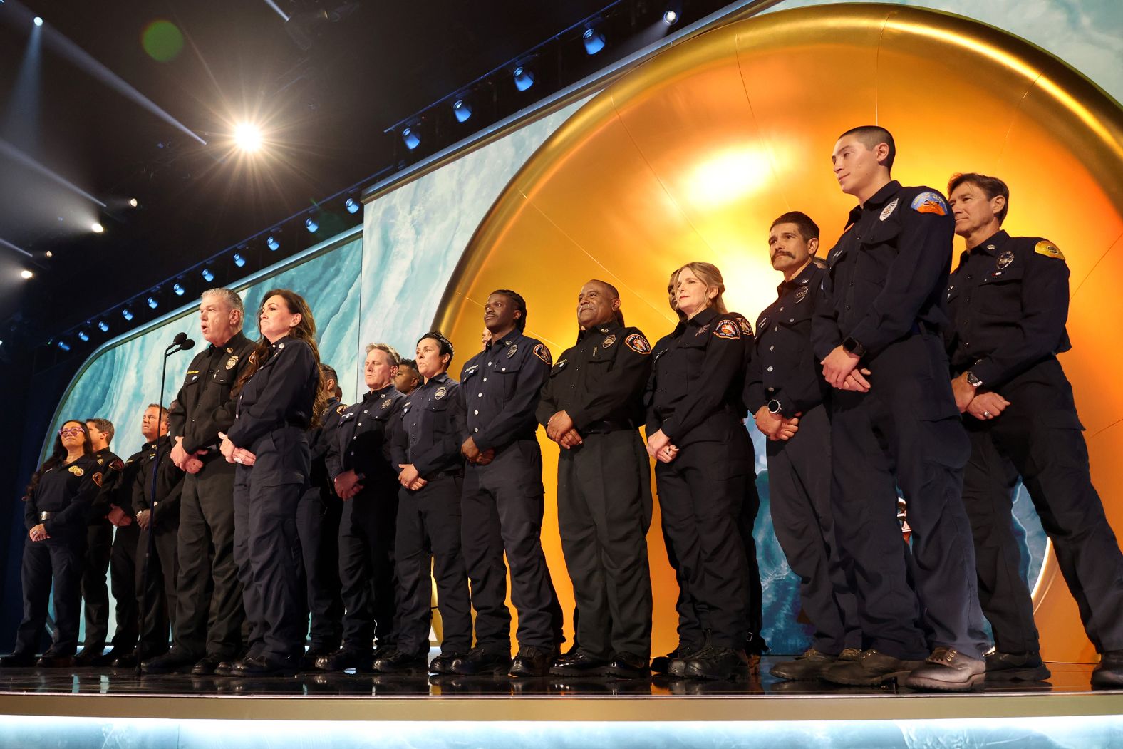 Members of the Los Angeles County Fire Department are <a href="https://www.cnn.com/entertainment/live-news/the-grammys-award-show-02-2-25#cm6ok11wx00333b6ma1k3f6zb">honored on stage</a> before the final Grammy was awarded. They received a standing ovation.