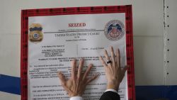 A "seized" sign is placed on a Venezuelan government airplane during a press conference where US Secretary of State Marco Rubio announced its seizure at La Isabela International Airport in Santo Domingo, on February 6, 2025. The United States on Thursday seized a second aircraft belonging to the Venezuelan government in less than a year during a visit to the Dominican Republic by Secretary of State Marco Rubio, despite nascent diplomacy with leftist leader Nicolas Maduro. (Photo by Mark Schiefelbein / POOL / AFP) (Photo by MARK SCHIEFELBEIN/POOL/AFP via Getty Images)          
