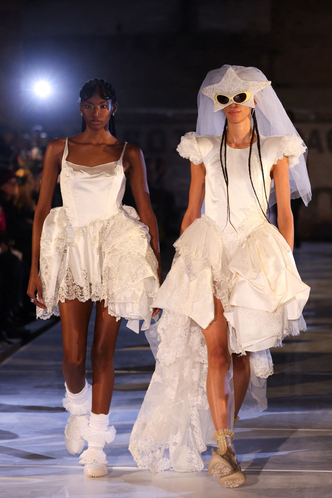 Models for Collina Strada celebrated queer love, sharing kisses on the runway in thrifted and upcycled bridal gowns.