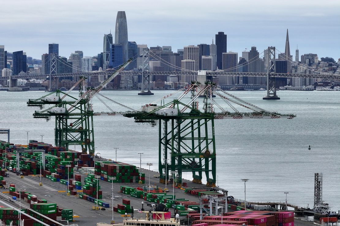 Shipping cranes sit idle at the Port of Oakland on February 3 in Oakland, California.