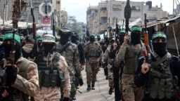Palestinian fighters from the Ezzedine al-Qassam Brigades, the armed wing of Hamas, take part in the funeral ceremony of Marwan Issa, a top Hamas commander killed in March 2024,  in the war-devastated Bureij refugee camp in the central Gaza Strip on February 7, 2025. (Photo by Eyad BABA / AFP) (Photo by EYAD BABA/AFP via Getty Images)          