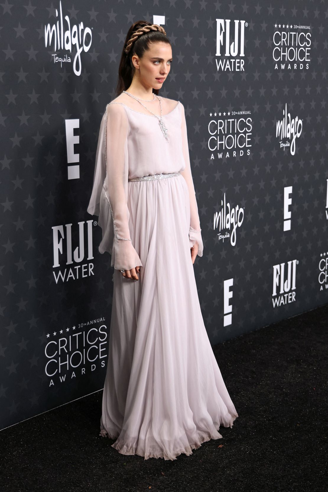 Margaret Qualley looked essential in a lavender silk chiffon and tulle dress from Chanel's latest haute couture collection.