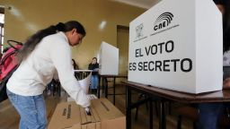 A woman casts her vote at a polling station during the presidential election in Quito on February 9, 2025. Some 14 million Ecuadorans began voting under tight security Sunday, choosing who will lead their violence-wracked Andean nation through its worst crisis in half a century. (Photo by ARMANDO PRADO / AFP) (Photo by ARMANDO PRADO/AFP via Getty Images)          