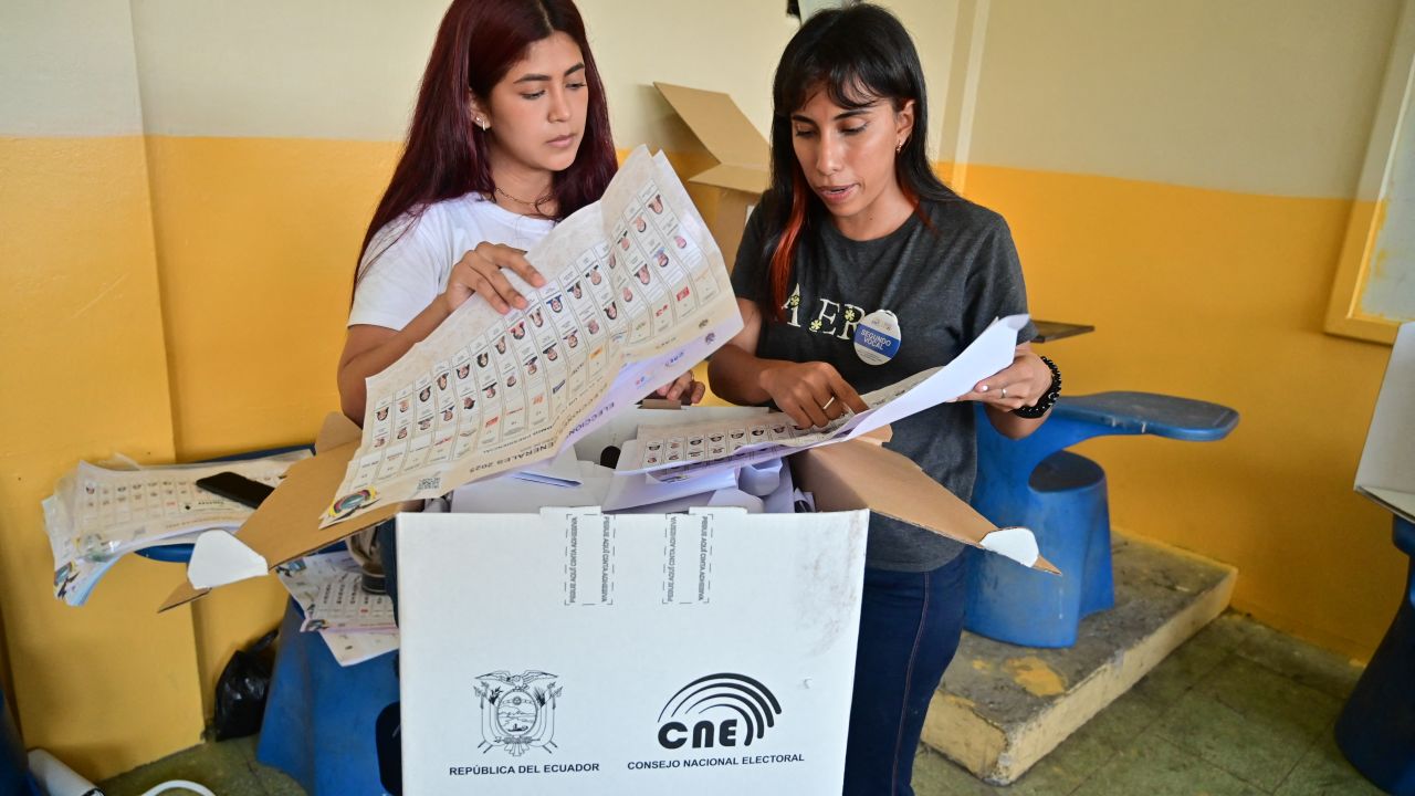 Election staffers count votes after the closing of a polling station during the presidential election at the Simón Bolívar school in Guayaquil, Ecuador, on February 9, 2025. Some 14 million Ecuadorians voted this Sunday to elect the next president in a country bled by drug violence, indebted and divided between the return of the left or the continuity of the current president, Daniel Noboa. (Photo by MARCOS PIN / AFP) (Photo by MARCOS PIN/AFP via Getty Images)          