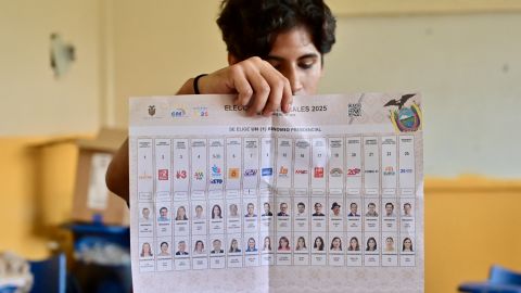 An election staffer counts votes after the closing of a polling station during the presidential election at the Simón Bolívar school in Guayaquil, Ecuador, on February 9, 2025. Some 14 million Ecuadorians voted this Sunday to elect the next president in a country bled by drug violence, indebted and divided between the return of the left or the continuity of the current president, Daniel Noboa. (Photo by MARCOS PIN / AFP) (Photo by MARCOS PIN/AFP via Getty Images)