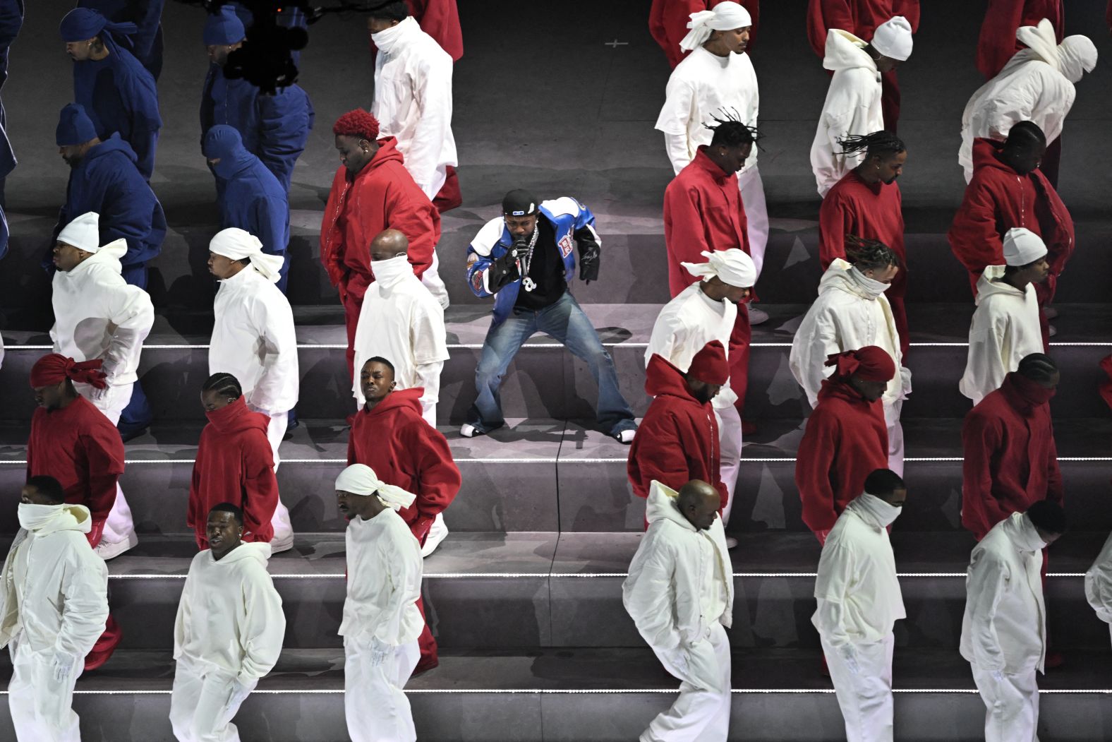 Lamar performs between dancers who were clad in red, white and blue.