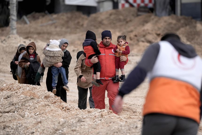 Palestinians start to leave as Israeli forces are seen taking security measures at the Nur Shams refugee camp on February 10, 2025.