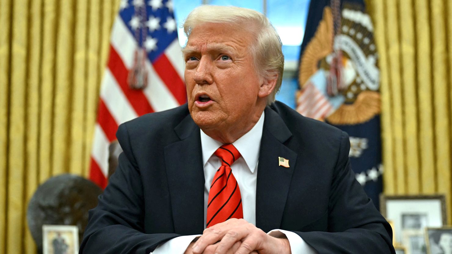 US President Donald Trump speaks to the press after signing an executive order in the Oval Office of the White House in Washington, DC, on February 10, 2025.