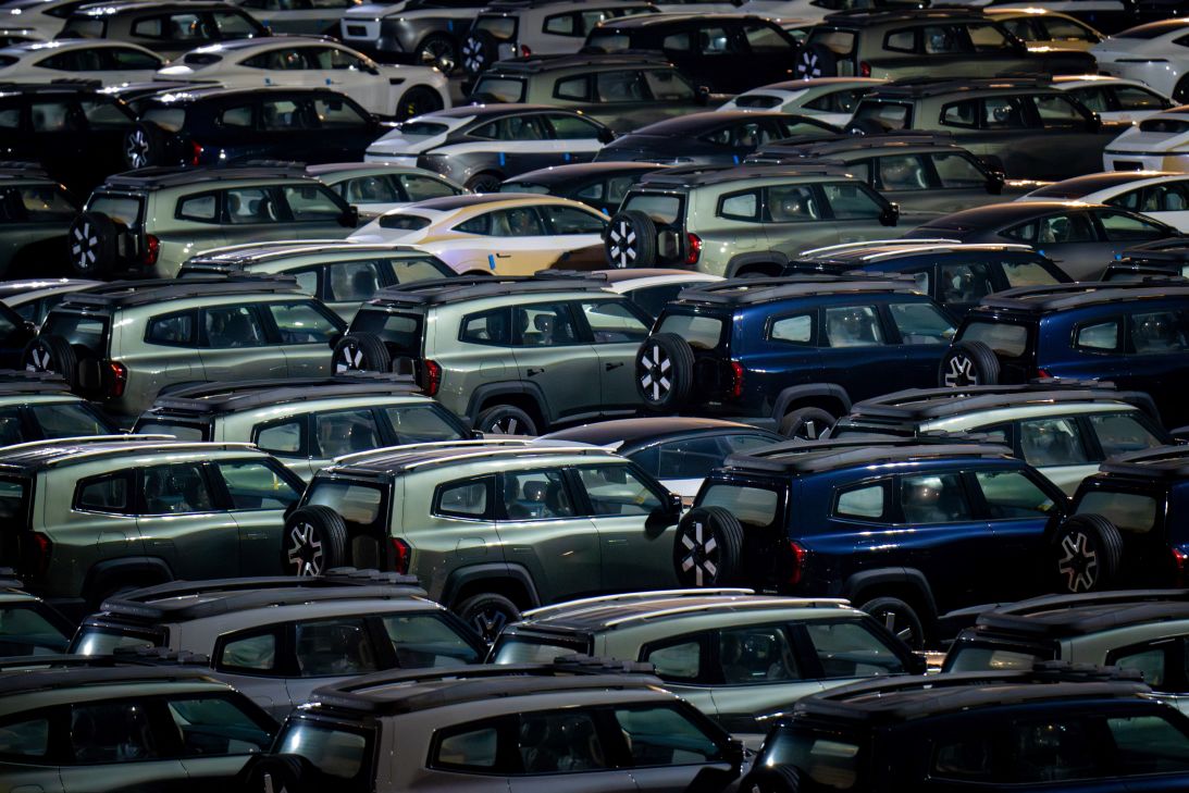 Cars made by Changan Automobile are seen at the company's vehicle distribution center in Chongqing on February 10. Cars made by Changan Automobile are seen at the company's vehicle distribution center in Chongqing on February 10.