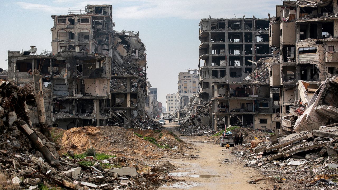TOPSHOT - Destroyed buildings are pictured in the west of Beit Lahia in the northern Gaza Strip on February 11, 2025 amid the current ceasefire deal in the war between Israel and Hamas. (Photo by BASHAR TALEB / AFP) (Photo by BASHAR TALEB/AFP via Getty Images)          