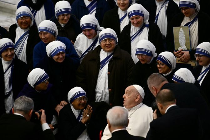 Pope Francis is joined by nuns at the Vatican in February 2025.