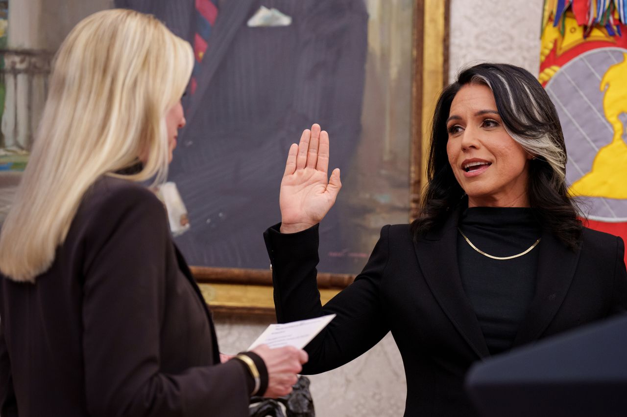 WASHINGTON, DC - FEBRUARY 12: Tulsi Gabbard is sworn in as Director of National Intelligence by Attorney General Pam Bondi in the Oval Office at the White House on February 12, 2025 in Washington, DC. Gabbard, who will oversee the 18 intelligence agencies and serve as Trump's advisory on intelligence, was confirmed by the Senate 52-48. (Photo by Andrew Harnik/Getty Images)