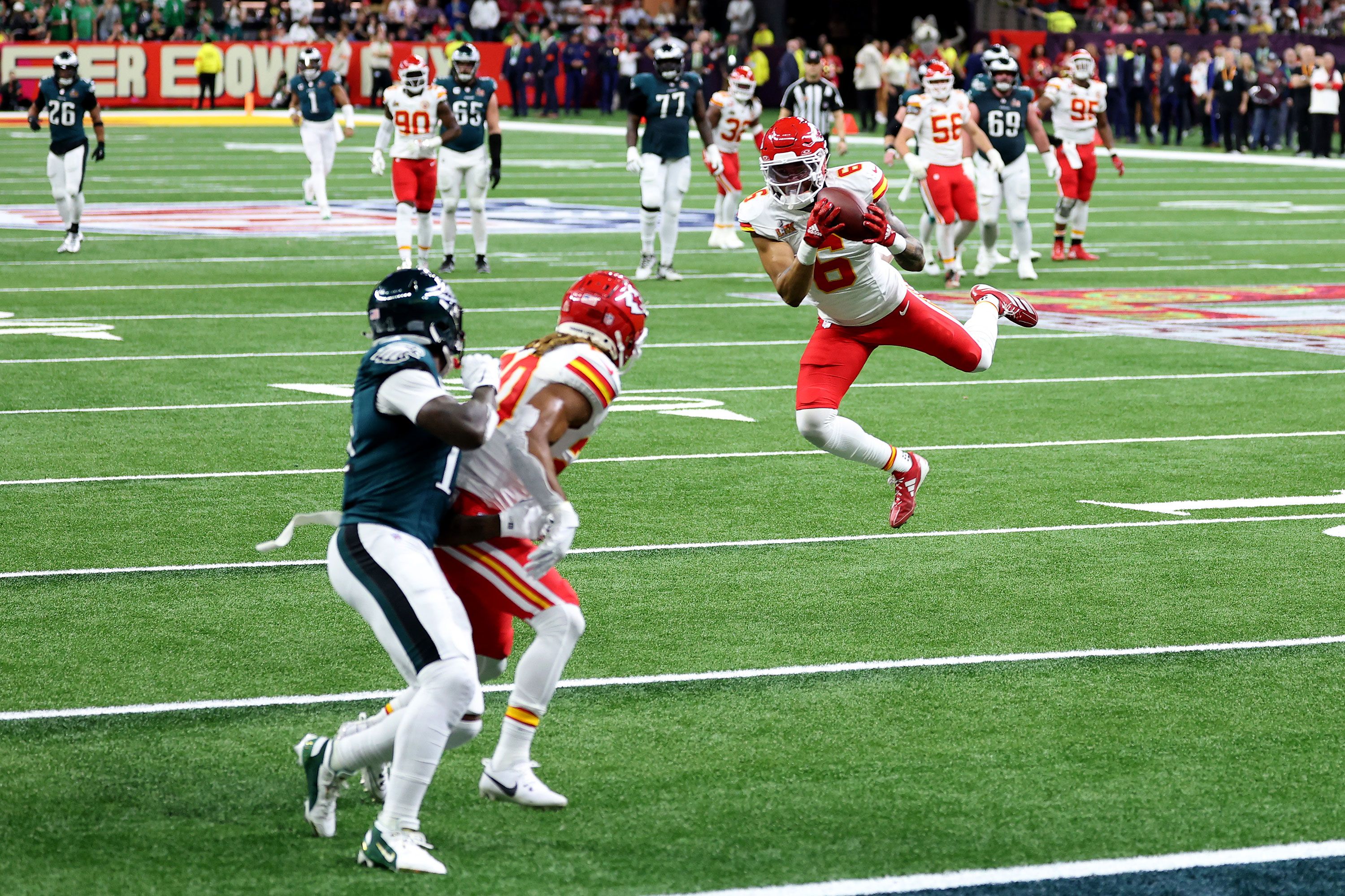 Chiefs safety Bryan Cook intercepts a Hurts pass early in the second quarter.