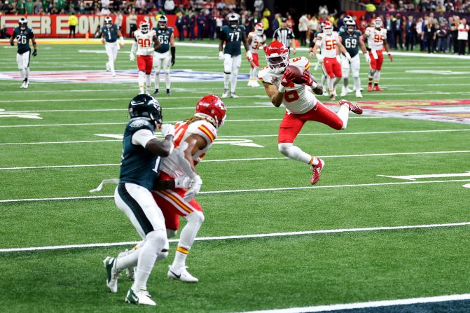 Chiefs safety Bryan Cook intercepts a Hurts pass early in the second quarter.