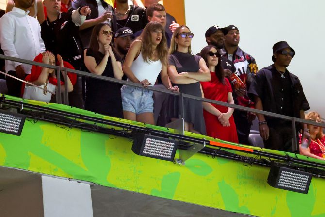 Taylor Swift, center, watches the first half at the Superdome. The singer's boyfriend, Chiefs tight end Travis Kelce, ended the half without a catch.