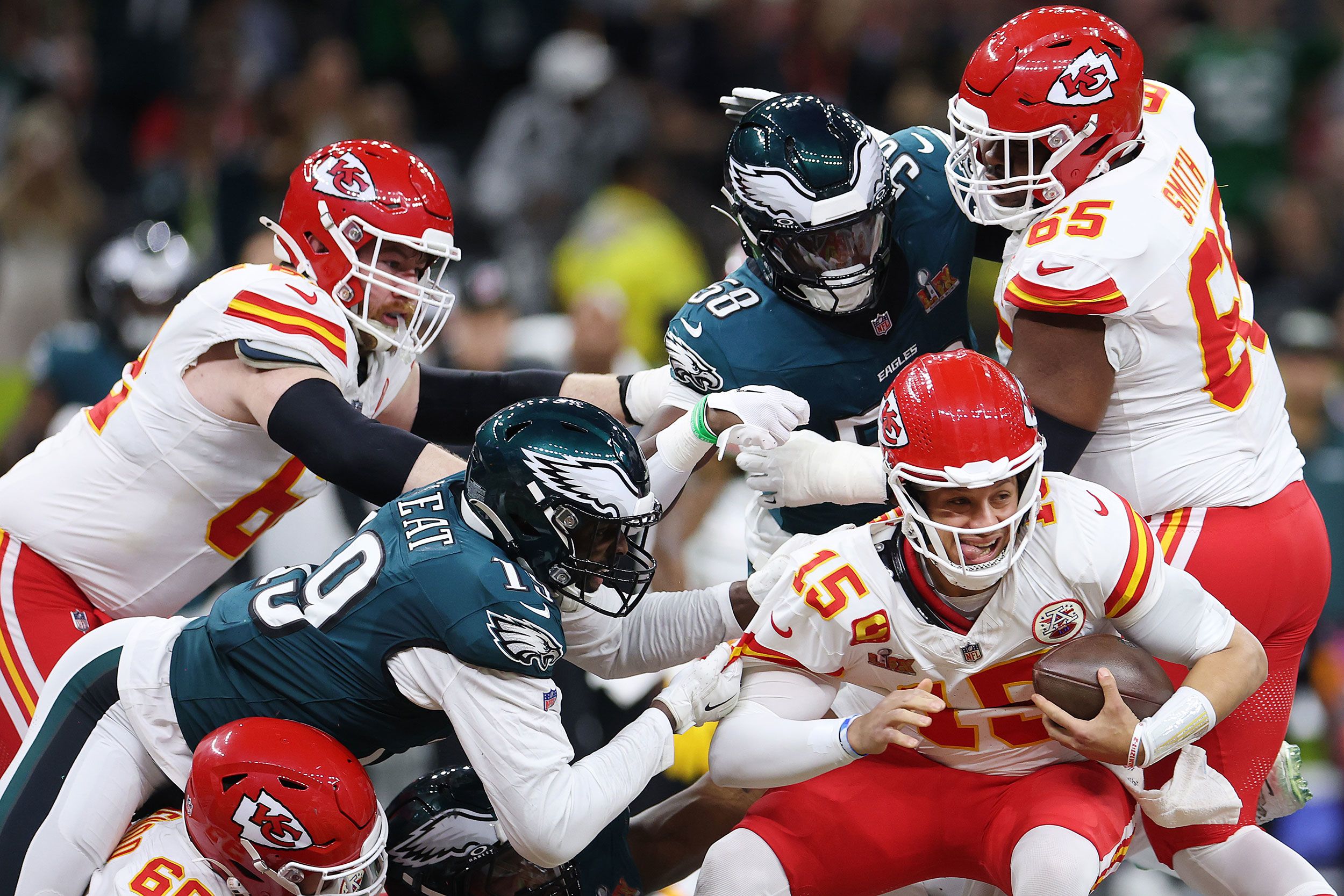 Mahomes is sacked by Josh Sweat, left, in the second quarter.