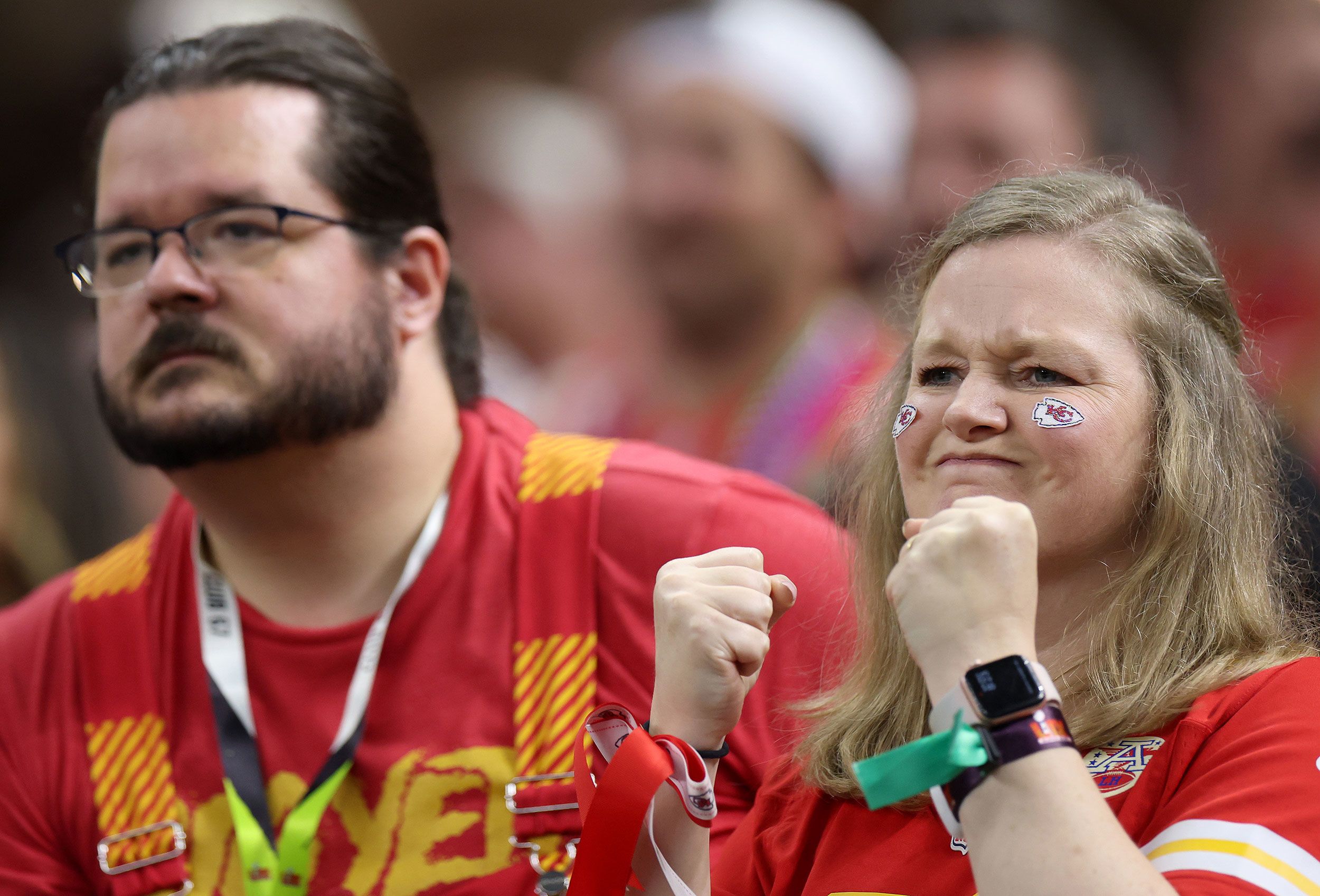 A Chiefs fan reacts while watching the game at the Superdome.