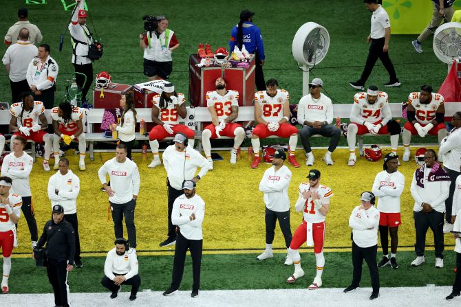 Chiefs players look on from the sidelines in the second half.