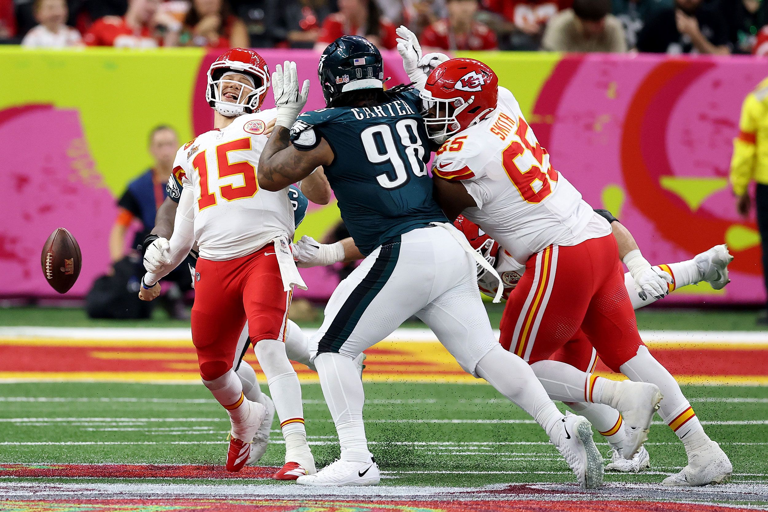 Mahomes fumbles the ball as his arm is hit by the Eagles' Milton Williams in the fourth quarter. The Eagles forced three Mahomes turnovers in the game.