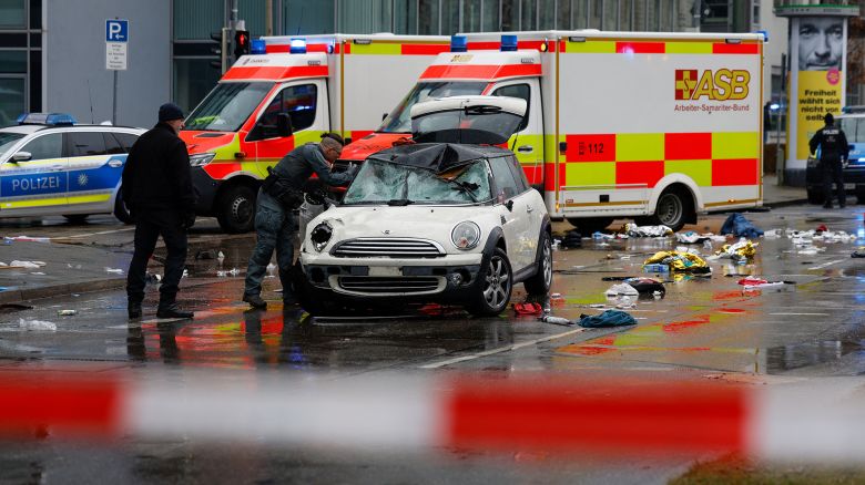 Members of the emergengy services work at the scene where a car drove into a crowd in the southern German city of Munich on February 13, 2025 leaving several people injured, police said. Munich police said on social media platform X that "several people were injured" after "a car drove into a group of people" in the centre of the Bavarian state capital. (Photo by Michaela STACHE / AFP) (Photo by MICHAELA STACHE/AFP via Getty Images)          