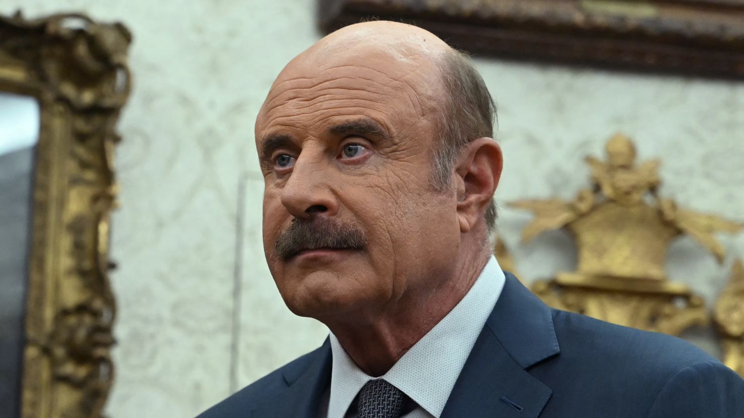 Phil McGraw, "Dr. Phil," attends a swearing-in ceremony for Robert F. Kennedy Jr., as Secretary of Health and Human Services in the Oval Office of the White House in Washington, DC, on February 13, 2025.