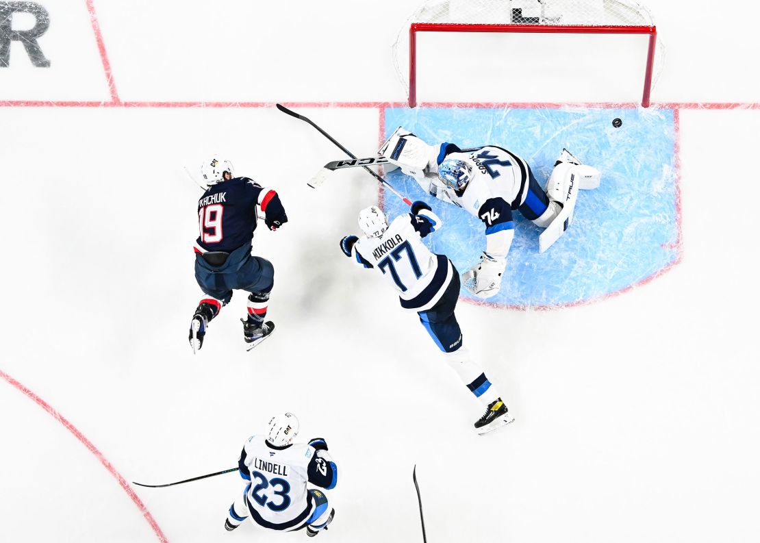 Matthew Tkachuk had two goals and an assist in Thursday's 6-1 win over Finland, a game in which he played alongside his brother, Brady, for the first time in a meaningful game.