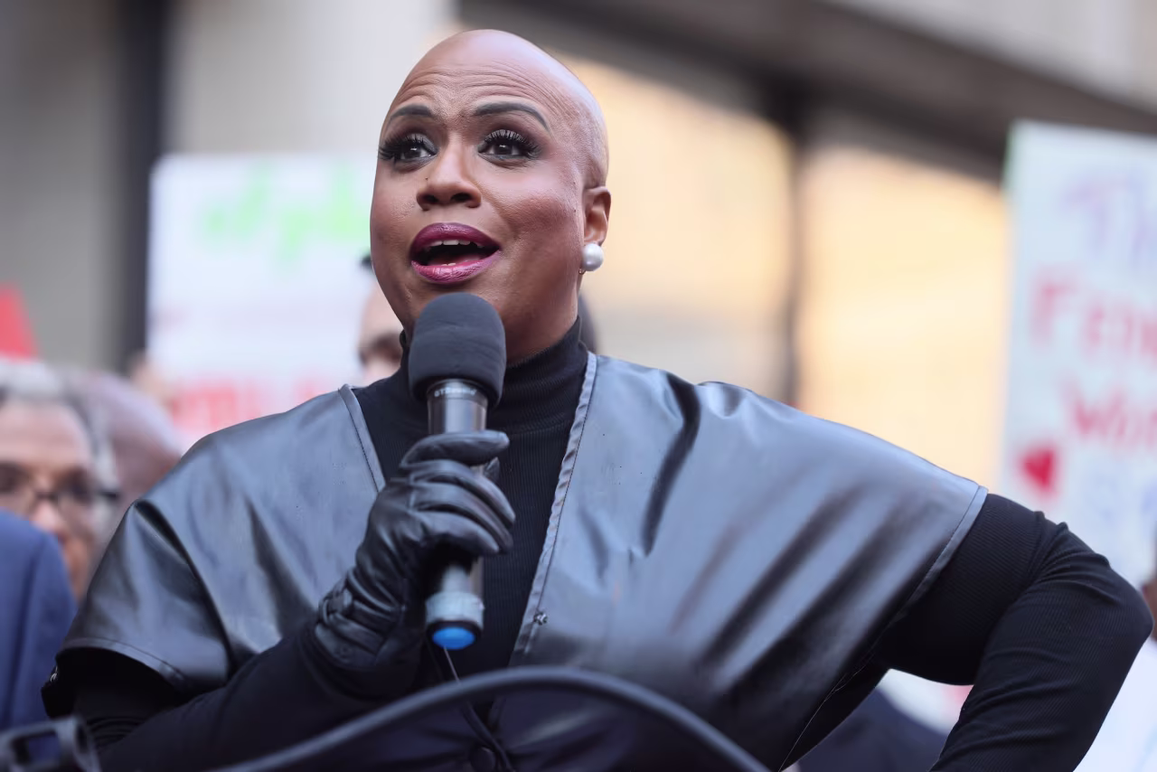 Rep. Ayanna Pressley speaks outside the Consumer Financial Protection Bureau building on Monday.