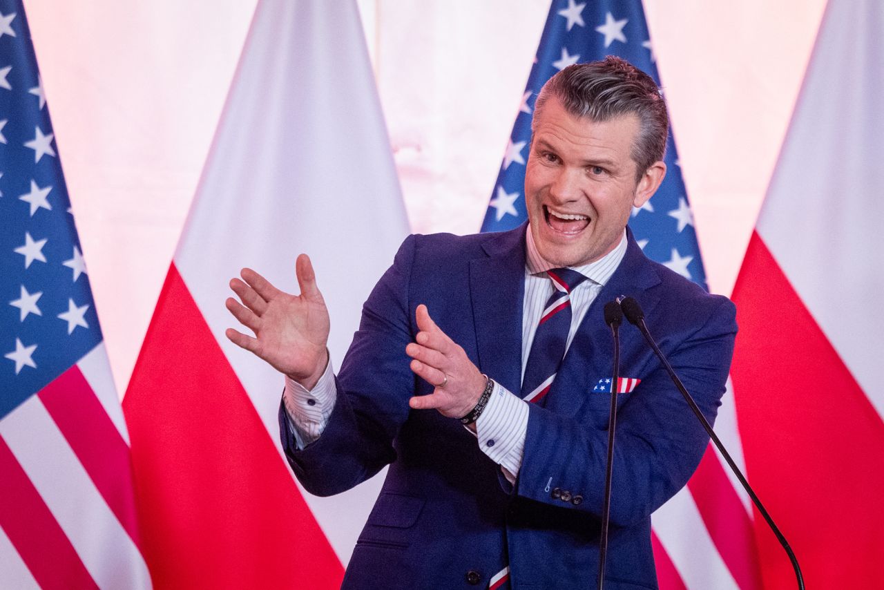 US Defense Secretary Pete Hegseth speaks during a news conference in Warsaw, Poland, on Friday.