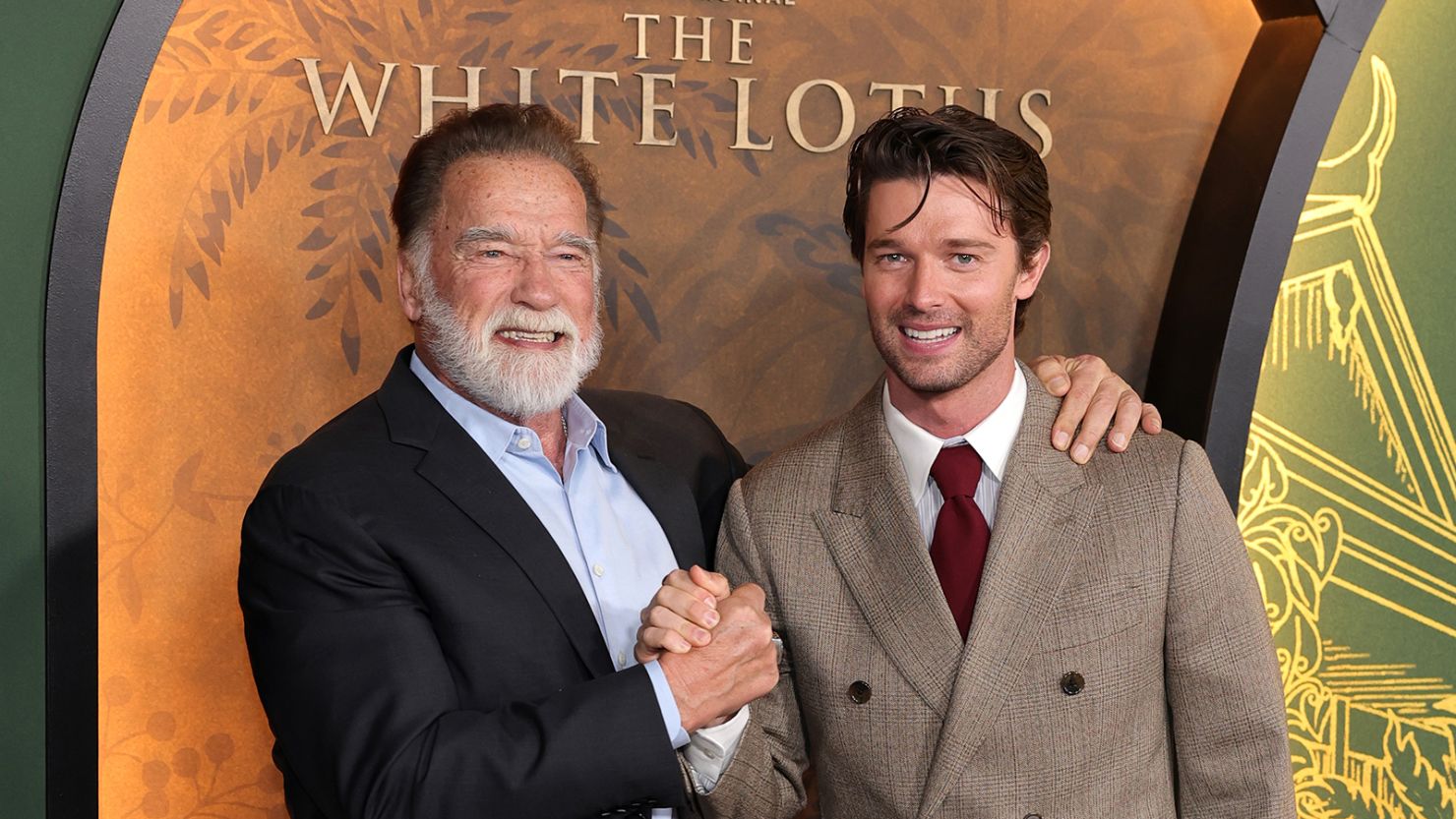 Arnold Schwarzenegger and Patrick Schwarzenegger arrive at the Los Angeles premiere of HBO Original Series "The White Lotus" Season 3 at Paramount Theatre on February 10, 2025 in Los Angeles.