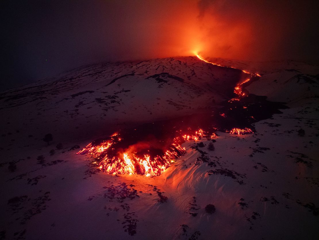 Lava flows from a fracture on the Mount Etna during an eruption of the volcano on February 14.