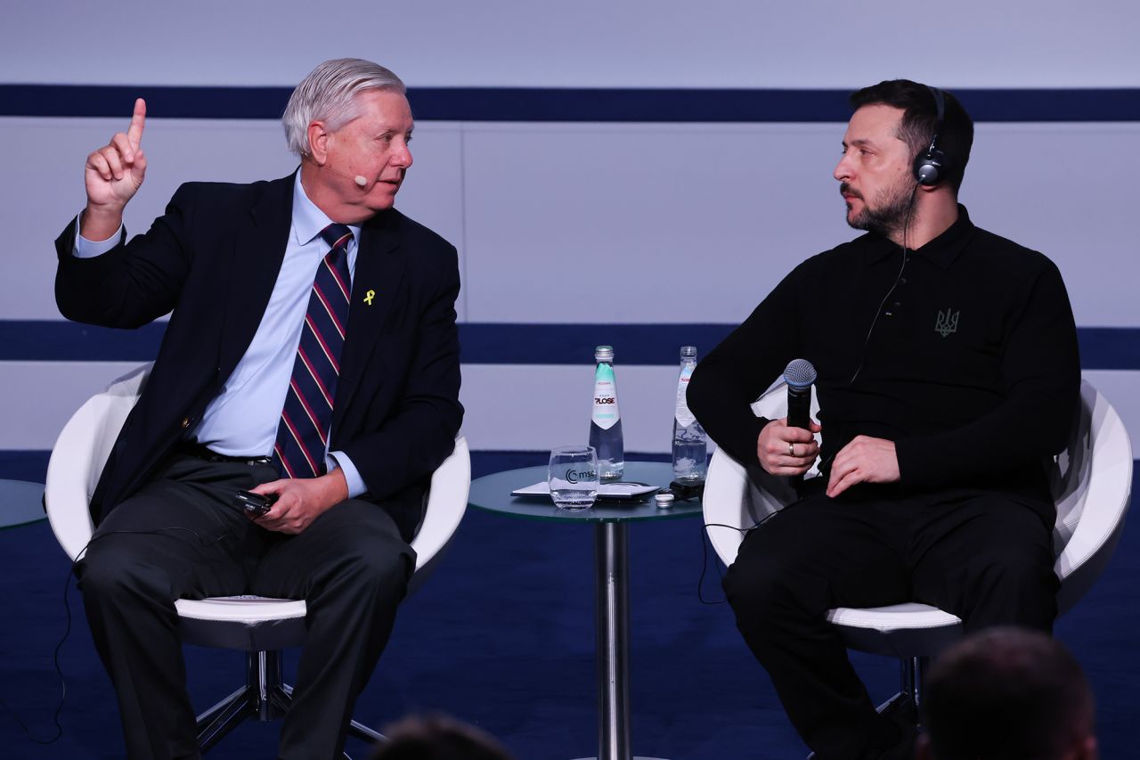 Senator Lindsey Graham and Ukrainian President Volodymyr Zelensky speak during the Munich Security Conference on Friday.