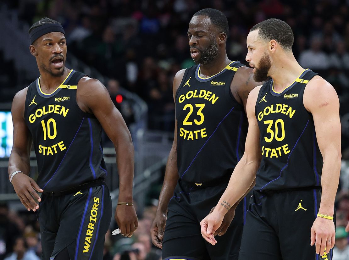 Jimmy Butler, Draymond Green and Stephen Curry during a game between the Golden State Warriors and the Milwaukee Bucks in Milwaukee, Wisconsin, on February 10.