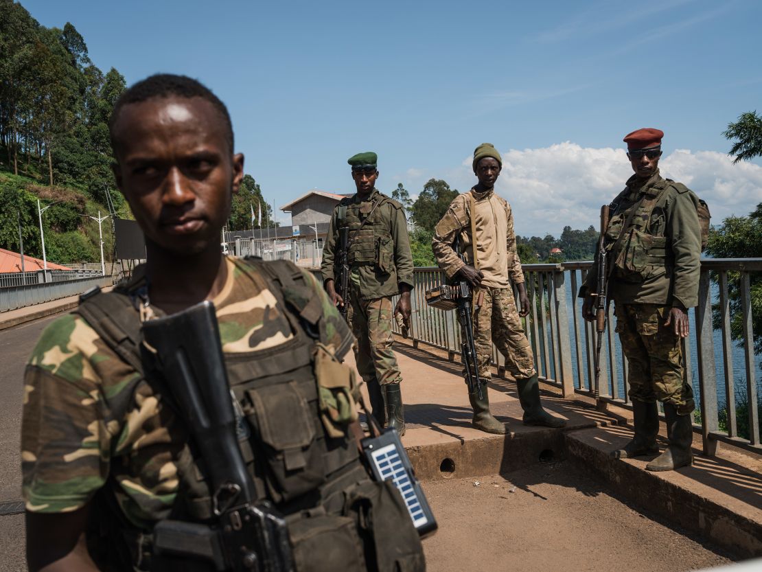 M23 rebel troops arrive at the Rusizi border post, joining the Congolese city of Bukavu with Cyangugu in Rwanda, on February 16, 2025 in Cyangugu, Rwanda.