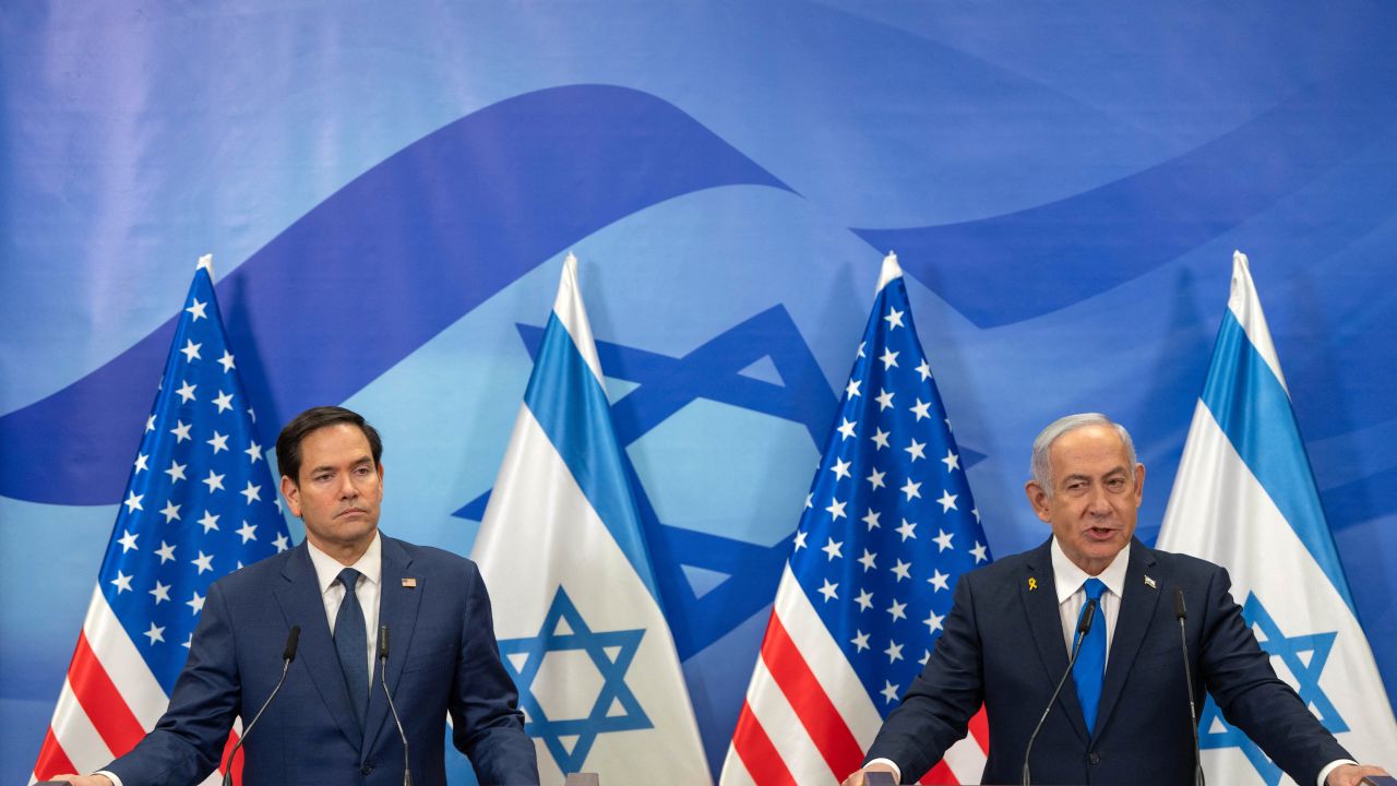 US Secretary of State Marco Rubio (L) and Israeli Prime Minister Benjamin Netanyahu make a t statement to the media at the prime minister's office in Jerusalem on February 16, 2025. Rubio said Palestinian militant group Hamas "must be eliminated", after meeting on February 16 with Israel's prime minister. (Photo by Ohad Zwigenberg / POOL / AFP) (Photo by OHAD ZWIGENBERG/POOL/AFP via Getty Images)          