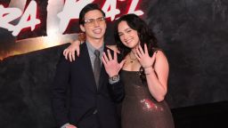 Tanner Buchanan and Mary Mouser arrive at Netflix's "Cobra Kai" Series Finale Premiere Event at The Egyptian Theatre Hollywood on February 12, 2025 in Los Angeles, California.
