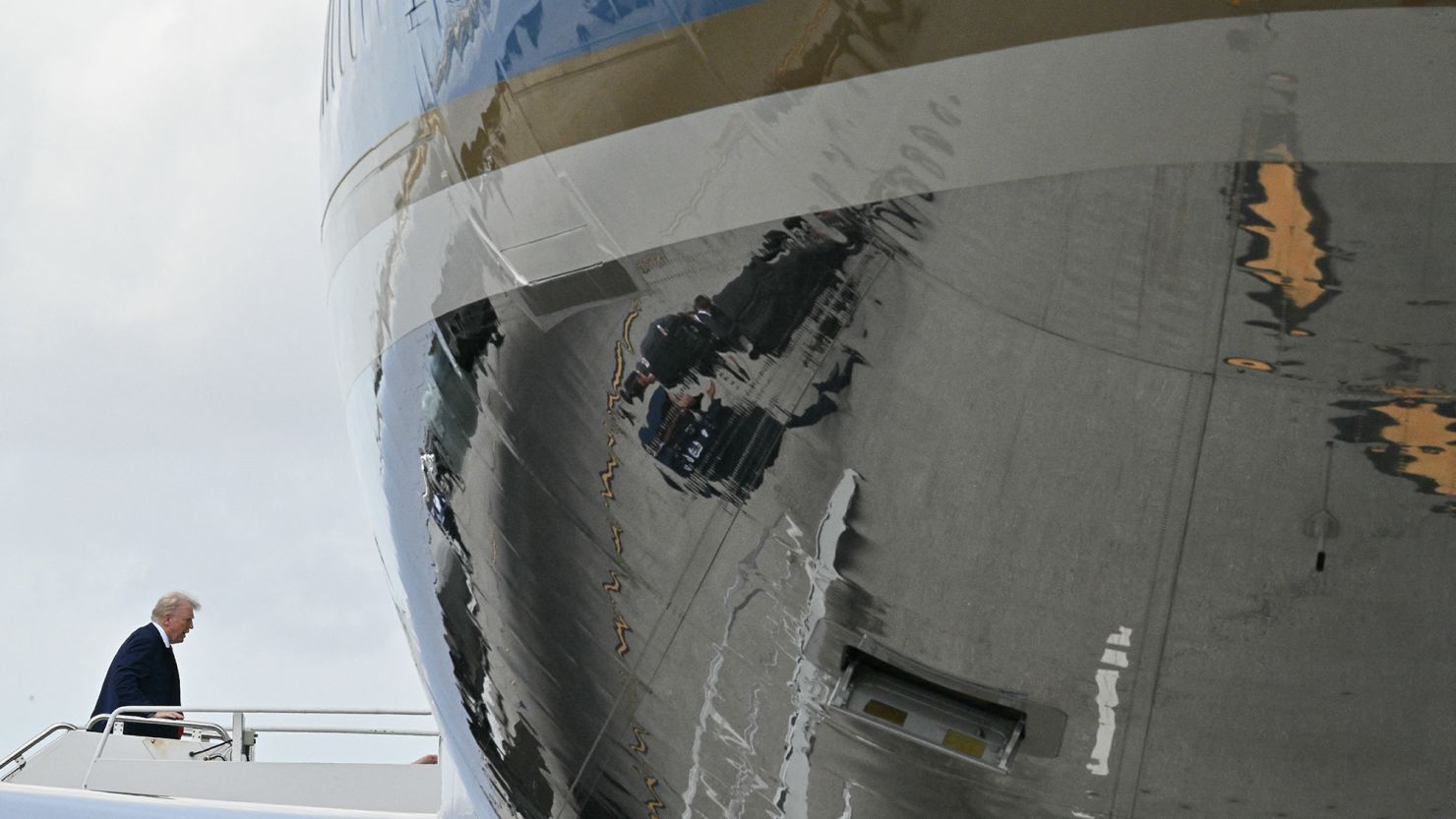 US President Donald Trump boards Air Force One at Palm Beach International Airport on February 16, 2025.