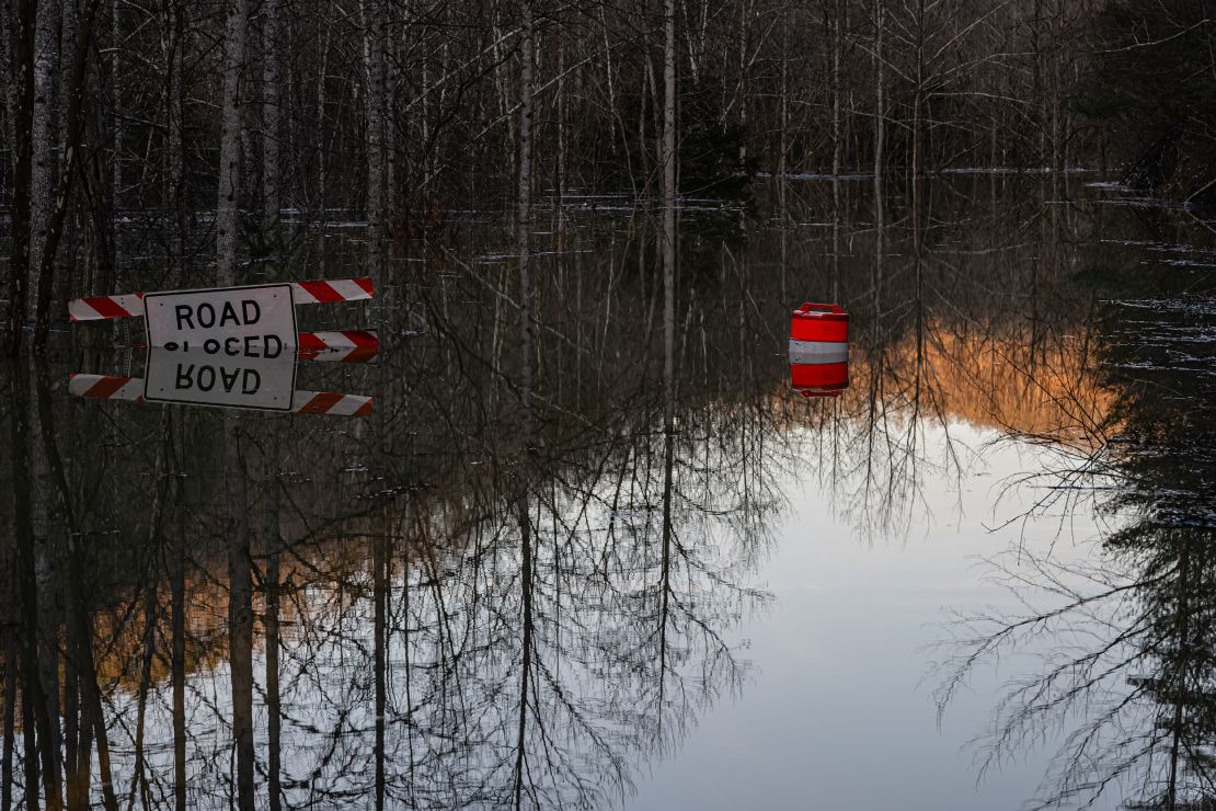 A flooded road that leads to a neighborhood in Hyden, Kentucky, on Monday.