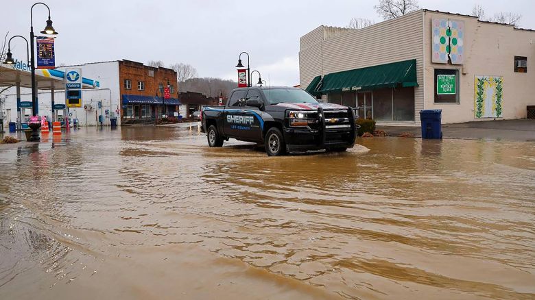 A Lee County sheriff's truck drives through floodwaters, Sunday, February 16, 2025, in downtown Beattyville after officials closed Main Street in the Eastern Kentucky town following severe overnight rain.
