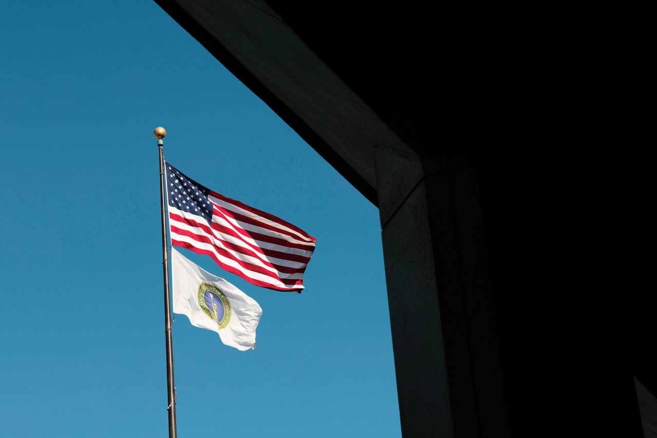 Flags are seen outside the Department of Energy in Washington, DC, on Friday.