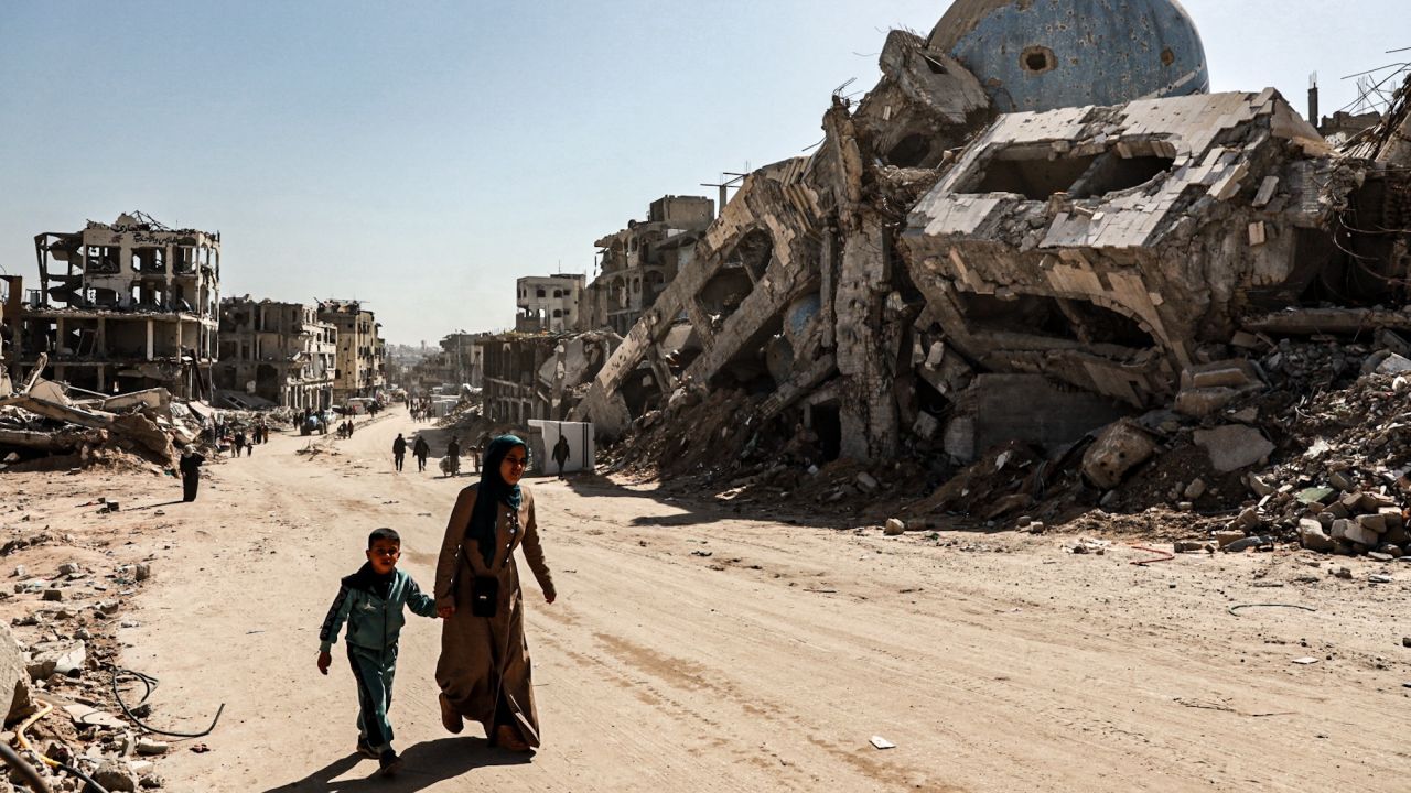 BEIT LAHIA, GAZA - FEBRUARY 18: Palestinians struggle to survive their daily lives in makeshift tents among the rubble of buildings destroyed by Israeli attacks in Beit Lahia city in the northern Gaza Strip on February 18, 2025. Daily life in Gaza continues under difficult conditions after the ceasefire agreement came into effect. (Photo by Abd Khaled/Anadolu via Getty Images)