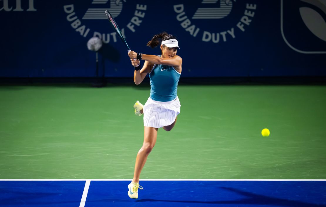 Raducanu plays a backhand against Moschová.