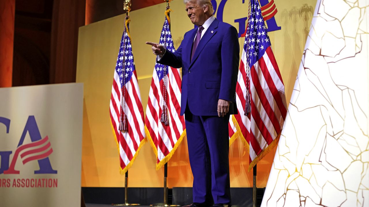 US President Donald Trump walks on stage to speak during a meeting of the Republican Governors Association at the National Building Museum in Washington, DC, on February 20, 2025. (Photo by Samuel Corum / AFP) (Photo by SAMUEL CORUM/AFP via Getty Images)          