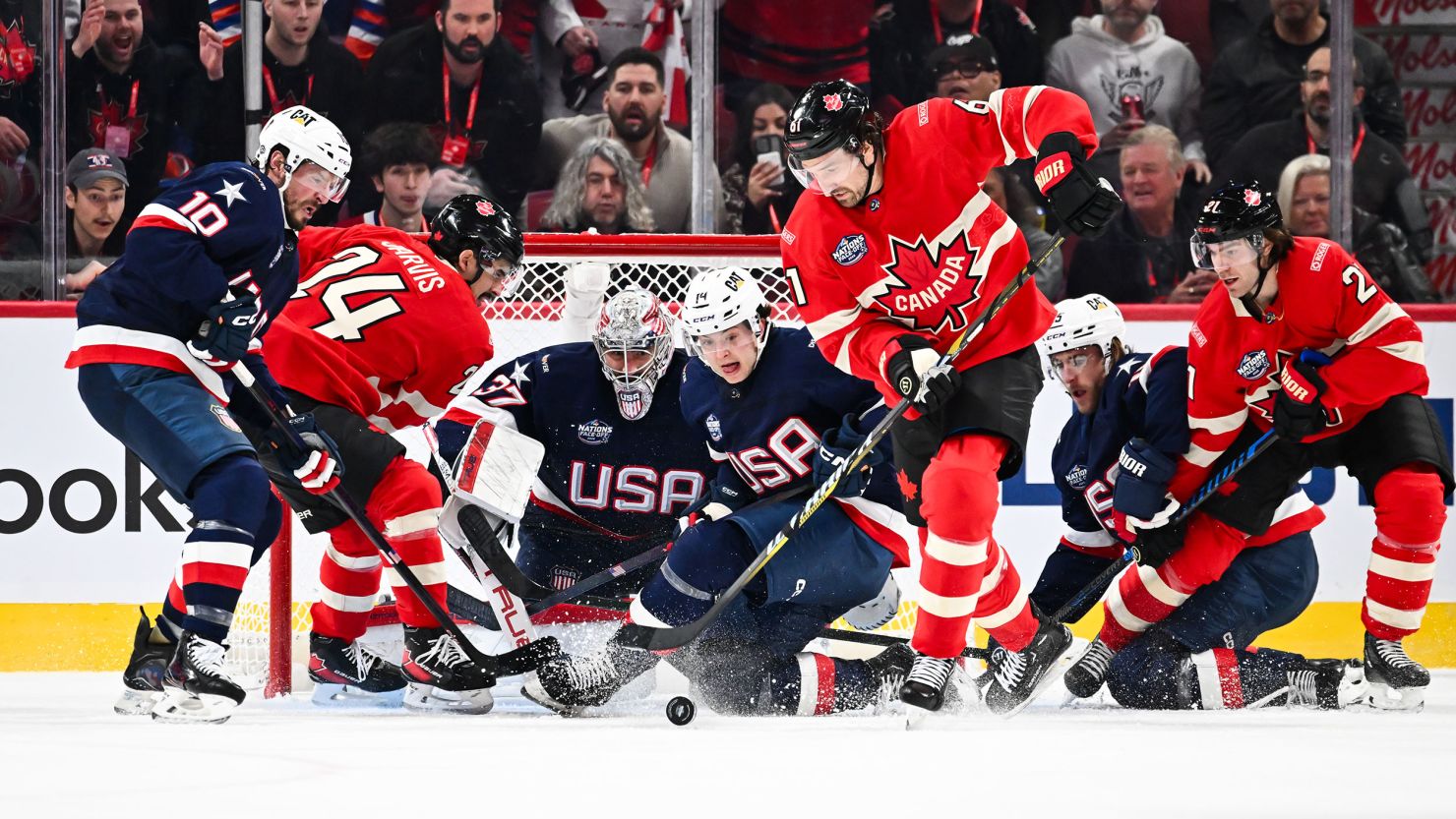 MONTREAL, CANADA - FEBRUARY 15: Goaltender Connor Hellebuyck #37 and teammate Brock Faber #14 of Team USA defend against Mark Stone #61 of Team Canada during the first period in the 2025 NHL 4 Nations Face-Off at the Bell Centre on February 15, 2025 in Montreal, Quebec, Canada. Team USA defeated Team Canada 3-1. (Photo by Minas Panagiotakis/Getty Images)