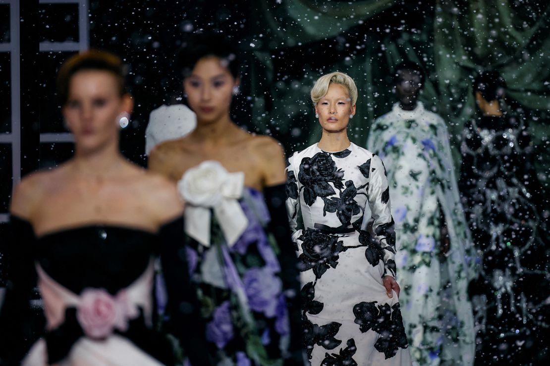 At Richard Quinn’s show, artificial snow fell as models walked in elegant gowns that nodded to Old Hollywood.