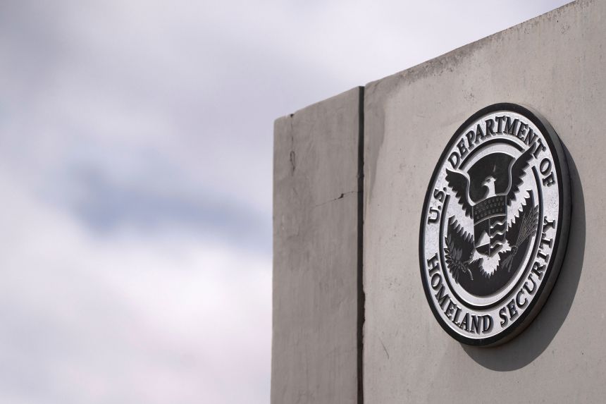 The seal of the US Department of Homeland Security, outside the Nogales-Mariposa port of entry on the US-Mexico border in Nogales, Arizona, in February.